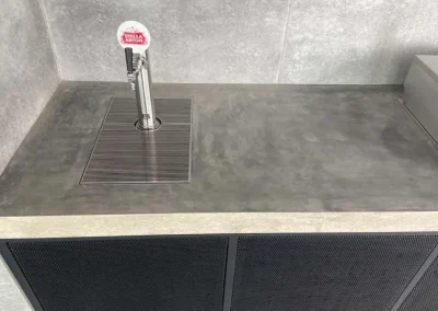 Concrete benchtop in Warriewood with a built-in beer tap for an outdoor bar