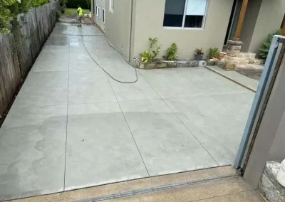 Concrete side path in Narraweena freshly poured alongside a garden bed